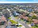 Wide aerial view of neighborhood and lake at 626 Brookfield Loop, Lake Mary, FL 32746