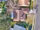 Overhead view of single Gathering home with brown roof and yard at 626 Brookfield Loop, Lake Mary, FL 32746