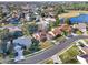 Bird's-eye view of a suburban neighborhood near a lake at 626 Brookfield Loop, Lake Mary, FL 32746
