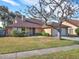 Well maintained exterior with mature landscaping at 626 Brookfield Loop, Lake Mary, FL 32746