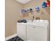 Convenient laundry room with washer and dryer at 626 Brookfield Loop, Lake Mary, FL 32746