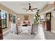 Spacious living room with comfy seating, a coffee table and large windows at 626 Brookfield Loop, Lake Mary, FL 32746