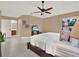 Main bedroom with en-suite bathroom and ample natural light at 626 Brookfield Loop, Lake Mary, FL 32746