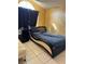 Bedroom with a modern bed frame and window with black curtains at 6868 Westlake Blvd, Orlando, FL 32810