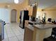 Kitchen with stainless steel refrigerator and wood cabinets at 6868 Westlake Blvd, Orlando, FL 32810