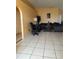 Living room with sectional sofa and tile flooring at 6868 Westlake Blvd, Orlando, FL 32810