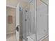 Large walk-in shower with glass enclosure at 8307 Fontera Dr, Davenport, FL 33896