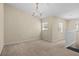 Inviting dining room with a chandelier and windows bringing in natural light at 8307 Fontera Dr, Davenport, FL 33896