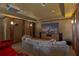 Entertainment goals! Private theater room with a large screen, projector, comfortable seating, and custom details at 9501 Hempel Cove Blvd, Windermere, FL 34786