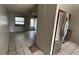 Kitchen features stainless steel appliances and wood cabinets at 990 Liskeard Ave, Orange City, FL 32763