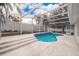 Inviting kidney-shaped pool with screened enclosure at 245 Heronwood Cir, Deltona, FL 32725