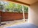 Small backyard with brick wall and gravel ground cover at 112 Augustus Pt, Sanford, FL 32773