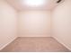 Empty carpeted bedroom with neutral walls at 112 Augustus Pt, Sanford, FL 32773