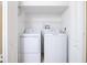 White stacked washer and dryer in a closet at 112 Augustus Pt, Sanford, FL 32773