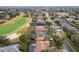 Aerial view of homes near golf course at 1395 Legendary Blvd, Clermont, FL 34711