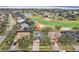 Home situated on a golf course community with a lake view at 1395 Legendary Blvd, Clermont, FL 34711