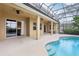 Relaxing pool and patio area, offering a refreshing escape in your own backyard at 1395 Legendary Blvd, Clermont, FL 34711