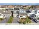 Two-story home aerial view with nice curb appeal, lovely front yard, and two car garage at 14789 Milfoil Ave, Orlando, FL 32827