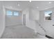 Bonus room with carpet, neutral walls, and bright windows at 14789 Milfoil Ave, Orlando, FL 32827