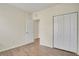 Bedroom with wood flooring and a closet at 1604 Scarlet Oak Loop # B, Winter Garden, FL 34787