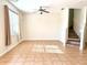 Spacious living room with tile floors and staircase at 1604 Scarlet Oak Loop # B, Winter Garden, FL 34787