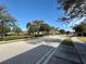 Quiet tree-lined street with well-maintained homes and landscaping at 1604 Scarlet Oak Loop # B, Winter Garden, FL 34787