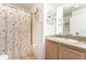 Clean bathroom with shower/tub combo and updated vanity at 212 Rialto Rd, Kissimmee, FL 34759