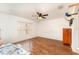 Charming bedroom with wood flooring and ceiling fan at 212 Rialto Rd, Kissimmee, FL 34759