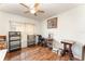 Bright home office with wood flooring and built-in shelving at 212 Rialto Rd, Kissimmee, FL 34759