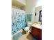 Clean bathroom with shower/tub combo and updated vanity at 2545 Old Kent Cir, Kissimmee, FL 34758