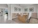 Modern dining room with a long wooden table at 2912 Moulin Rd, Davenport, FL 33837