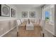 Light-filled dining room with wooden table and six chairs at 2912 Moulin Rd, Davenport, FL 33837