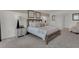 Main bedroom with a large bed, nightstands, and sitting area at 2916 Moulin Rd, Davenport, FL 33837