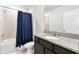 Bathroom with tub, shower, and granite countertop at 309 Citrus Isle Loop, Davenport, FL 33837