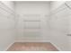 Walk-in closet with wire shelving for ample storage at 309 Citrus Isle Loop, Davenport, FL 33837