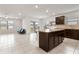 Kitchen with an island and stainless steel appliances at 309 Citrus Isle Loop, Davenport, FL 33837