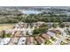 Aerial view showing a house's location in a neighborhood near a lake at 3131 Ash Park Loop, Winter Park, FL 32792