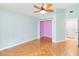 Spacious bedroom with light walls, ceiling fan and parquet flooring at 3131 Ash Park Loop, Winter Park, FL 32792