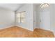 Light and airy entryway with hardwood floors at 3131 Ash Park Loop, Winter Park, FL 32792