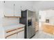 Kitchen with stainless steel appliances and white cabinets at 3131 Ash Park Loop, Winter Park, FL 32792