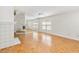 Living room with hardwood floors, fireplace, and mirror at 3131 Ash Park Loop, Winter Park, FL 32792