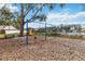 Community playground with swings, slide, and nearby tennis courts at 3131 Ash Park Loop, Winter Park, FL 32792