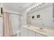 Bathroom with shower/tub combo and double vanity at 3235 Abiaka Dr, Kissimmee, FL 34743