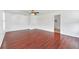 Spacious bedroom with wood flooring and a large window at 3235 Abiaka Dr, Kissimmee, FL 34743