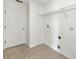 Laundry room with washer/dryer hookups and storage at 3235 Abiaka Dr, Kissimmee, FL 34743