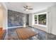 Dining room with blue marble accent wall and large windows at 3645 Mirror Lake Dr, Apopka, FL 32703