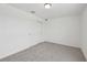 Bedroom with neutral carpet features a closet with sliding doors at 3801 Giorgio Dr, Winter Haven, FL 33884