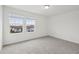 Bright bedroom featuring carpeted floors and large windows at 3833 Giorgio Dr, Winter Haven, FL 33884