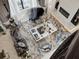 Aerial view of luxurious living room featuring high ceilings, designer decor, statement fireplace, and a grand piano at 4089 Isabella Cir, Windermere, FL 34786