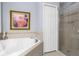 Bathroom features a large soaking tub and shower at 4220 Cleary Way, Orlando, FL 32828